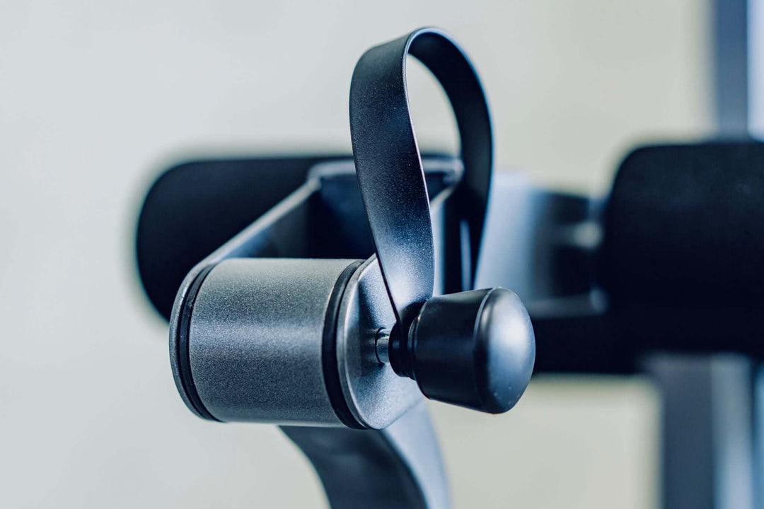 Close-up of adjustable tension knob on AAB83 fitness bench for targeted workouts in Calgary, Vancouver, Alberta, Canada.