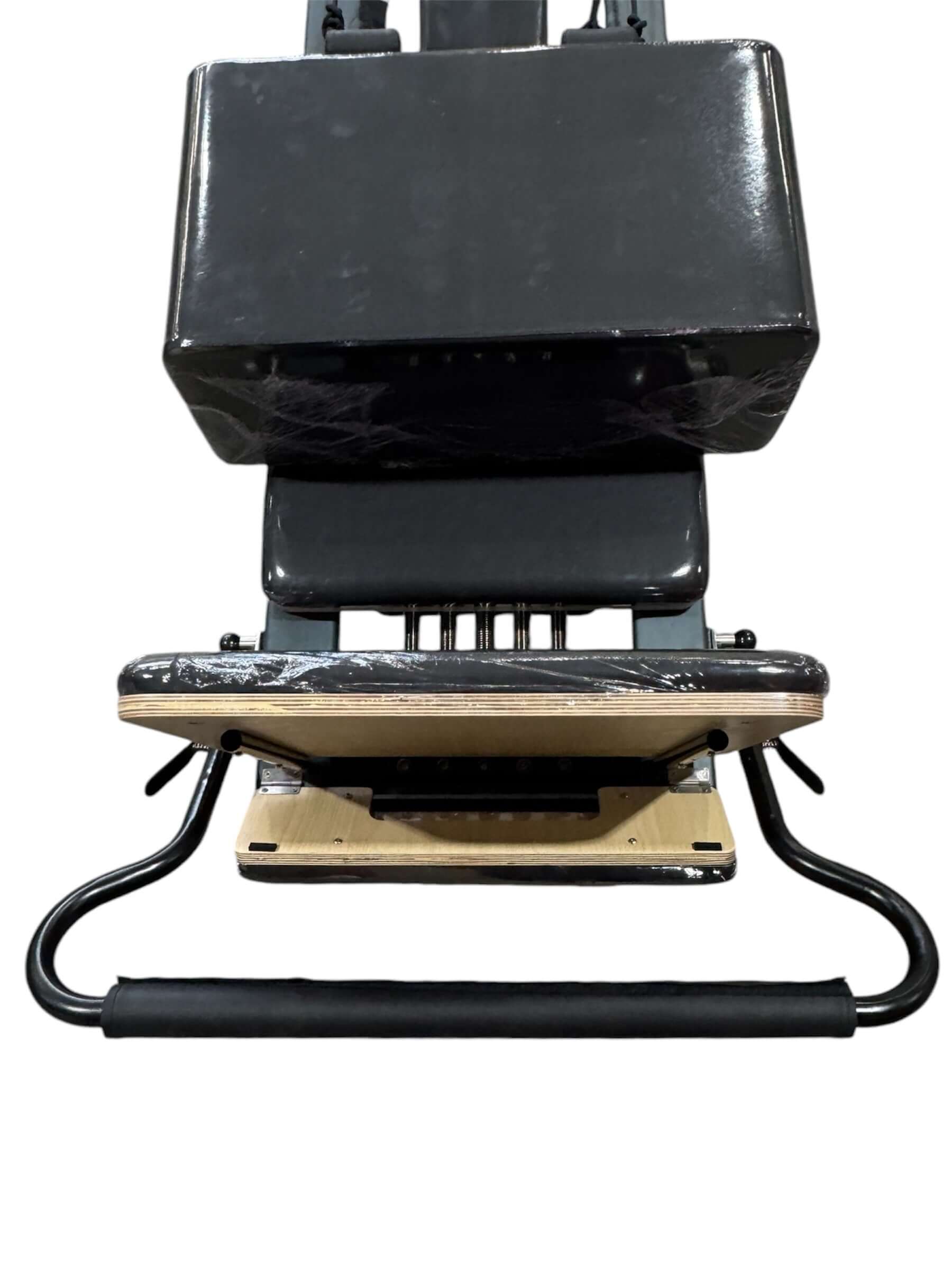 Pilates Reformer M apparatus for strength training, featuring adjustable springs and smooth sliding carriage.