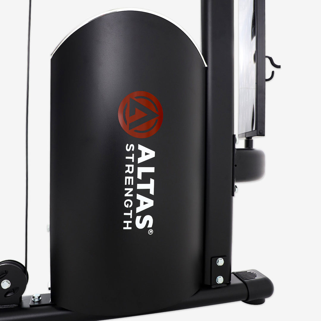 Black piece of exercise equipment with 'Alta Strength' logo on a white background