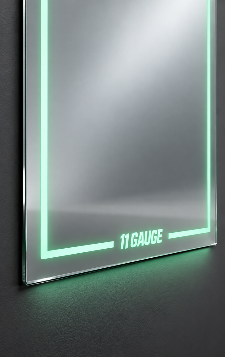 MR1000 mirror lower illuminated border and 11GAUGE wordmark — detail illustration