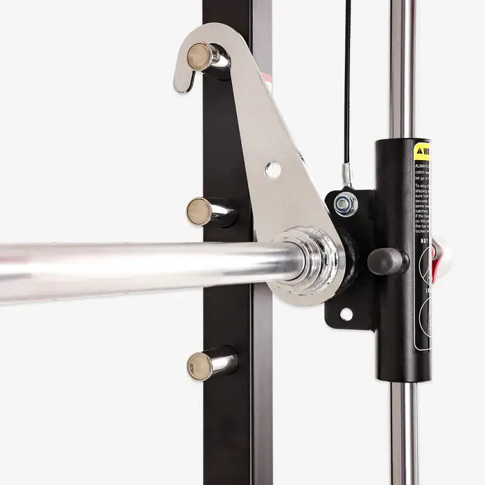 Close-up of the ALTAS AL-3058G Smith machine barbell and pulley system, showcasing high-quality gym equipment for home use.