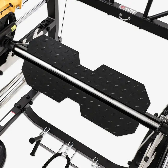 ALTAS AL-M810 Smith Machine equipment close-up view of the textured weightlifting platform for effective strength training.