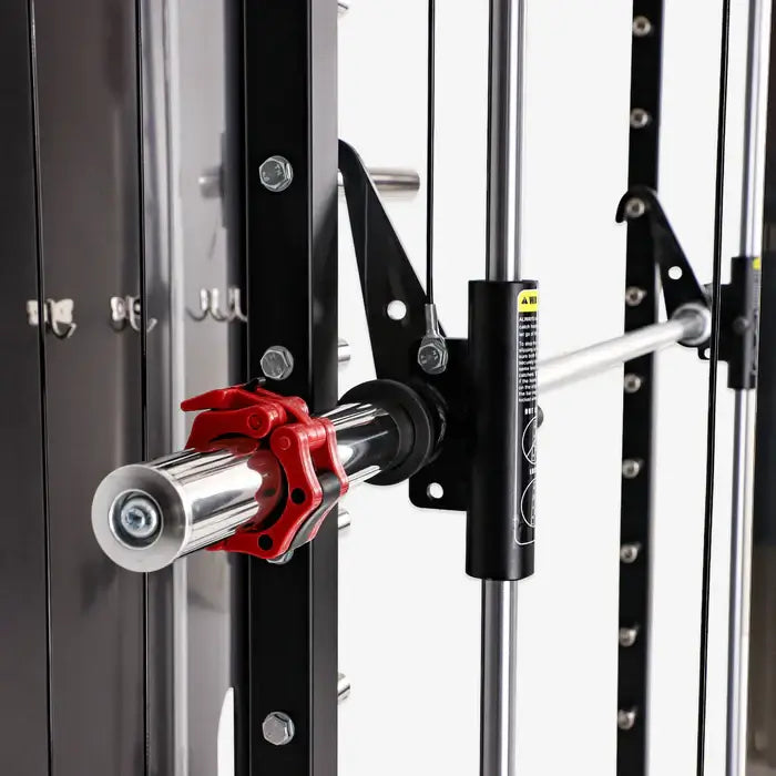 Close-up of the barbell attachment and safety locks on the ALTAS AL-3058G Smith Machine home gym equipment.