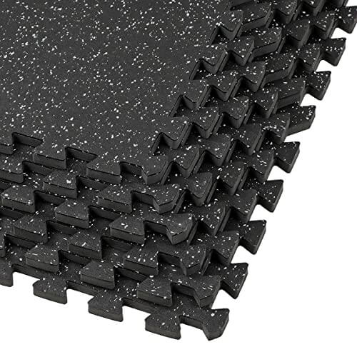 Interlocking rubber mats for gym flooring, providing stability and noise reduction for weights and equipment in Calgary.