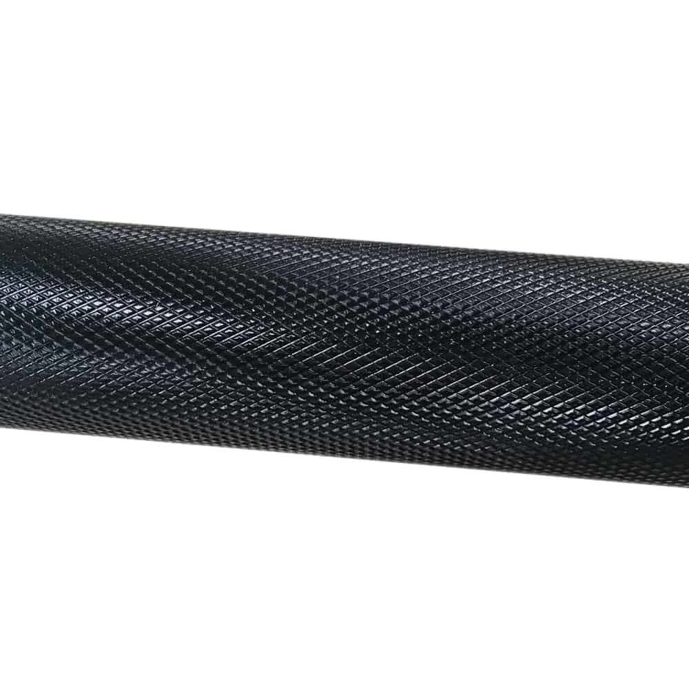 Close-up of a loadable dumbbell bar with a textured grip, ideal for home and commercial gym equipment in Calgary.