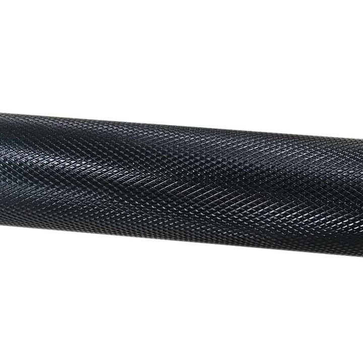 Close-up of a loadable dumbbell bar with a textured grip, ideal for home and commercial gym equipment in Calgary.