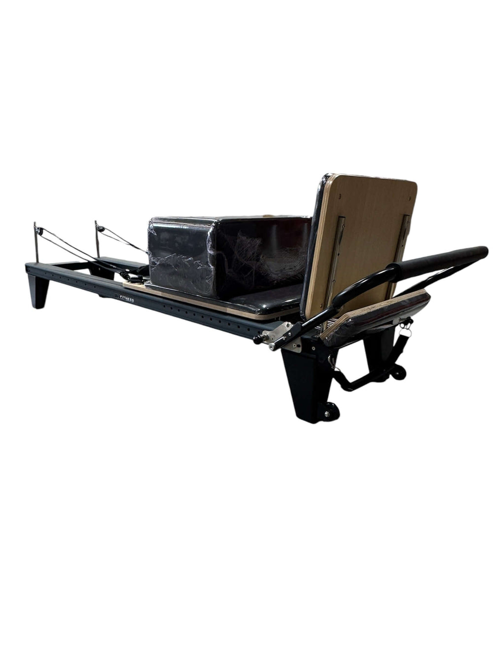Pilates Reformer M, a sleek gym equipment for strength training and flexibility, ideal for home gyms in Calgary.