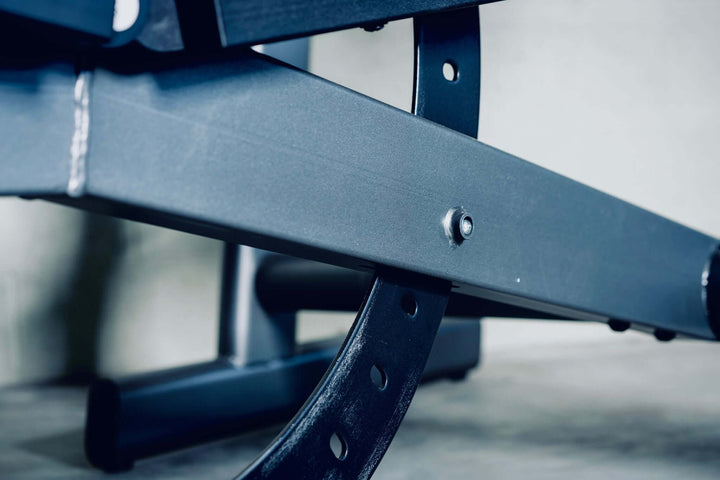 Close-up of the sturdy steel frame of the X-RIVAL Press Bench ABP30, ideal for gym equipment in Calgary.